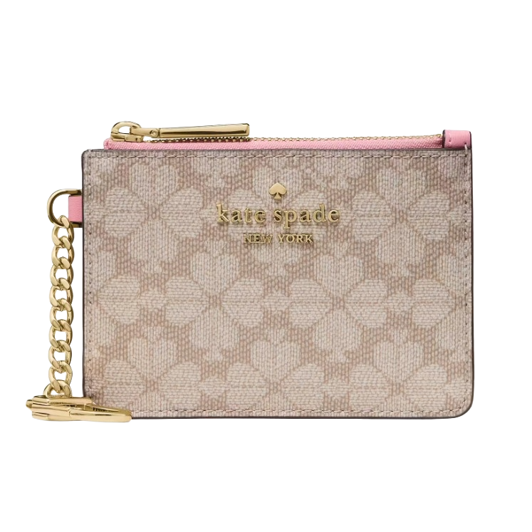 A Kate Spade New York pouch with a pink zipper, gold hardware, and a chain. The design features a floral pattern on a beige background.