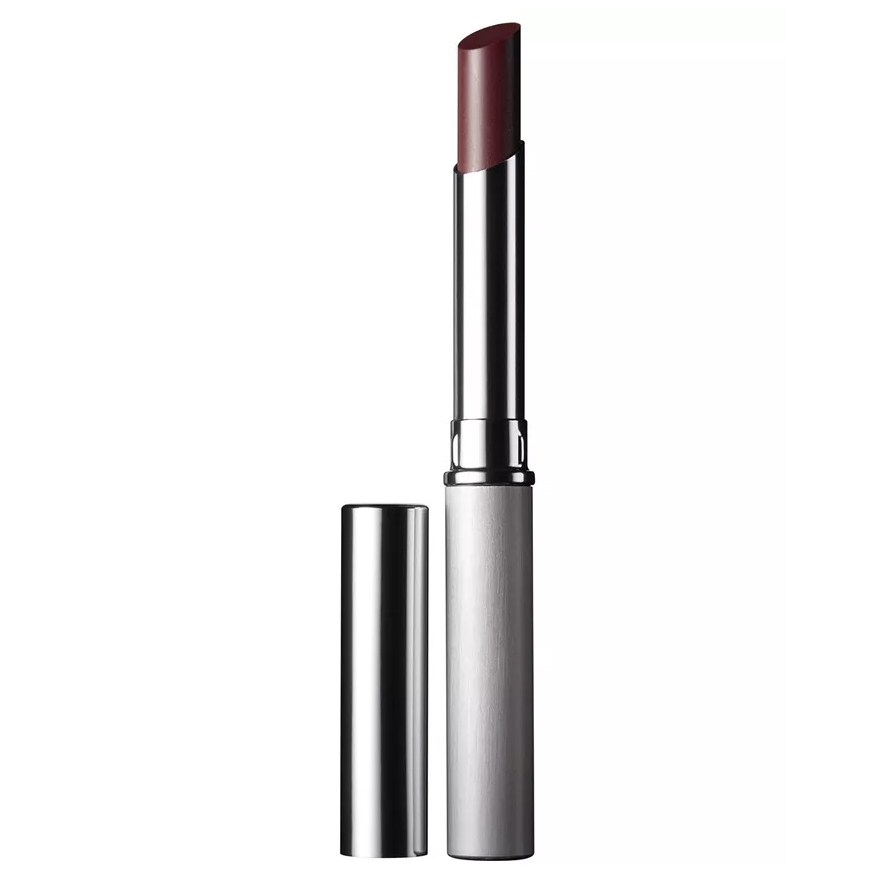 Clinique Black Honey Lipstick features a sleek silver tube with a deep, sheer plum shade. It's designed to complement various skin tones for a natural look.