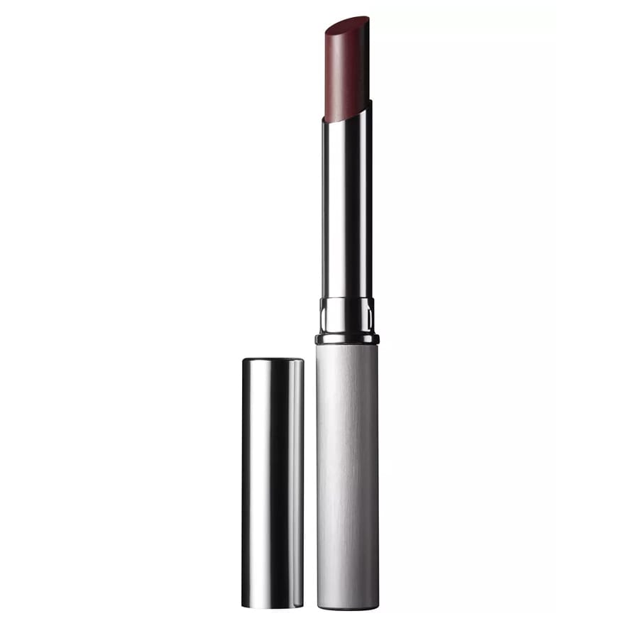 Clinique Black Honey Lipstick features a sleek silver tube with a deep, sheer plum shade. It's designed to complement various skin tones for a natural look.