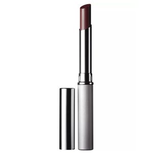 Clinique Black Honey Lipstick features a sleek silver tube with a deep, sheer plum shade. It's designed to complement various skin tones for a natural look.