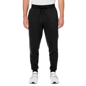 Under Armour Fleece Joggers are black, with an adjustable waistband and cuffed ankles. They feature side pockets and are paired with white athletic shoes.