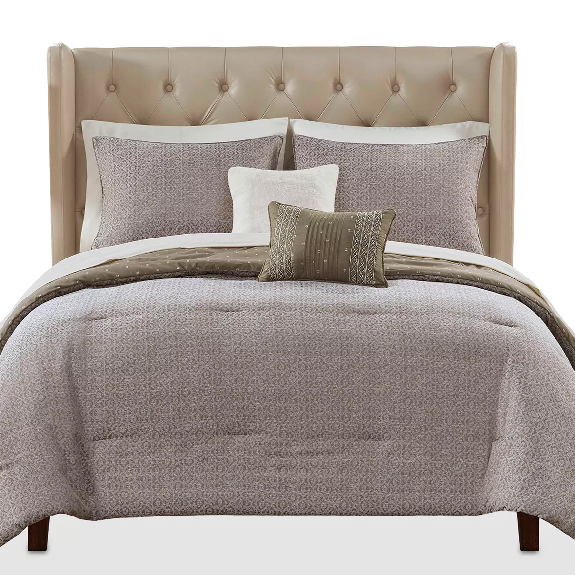 Beige tufted headboard with a gray patterned comforter set, including two matching pillows and two smaller decorative pillows in light and olive tones.