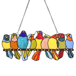 A stained glass panel featuring colorful birds perched together, designed to be hung with the attached chain.