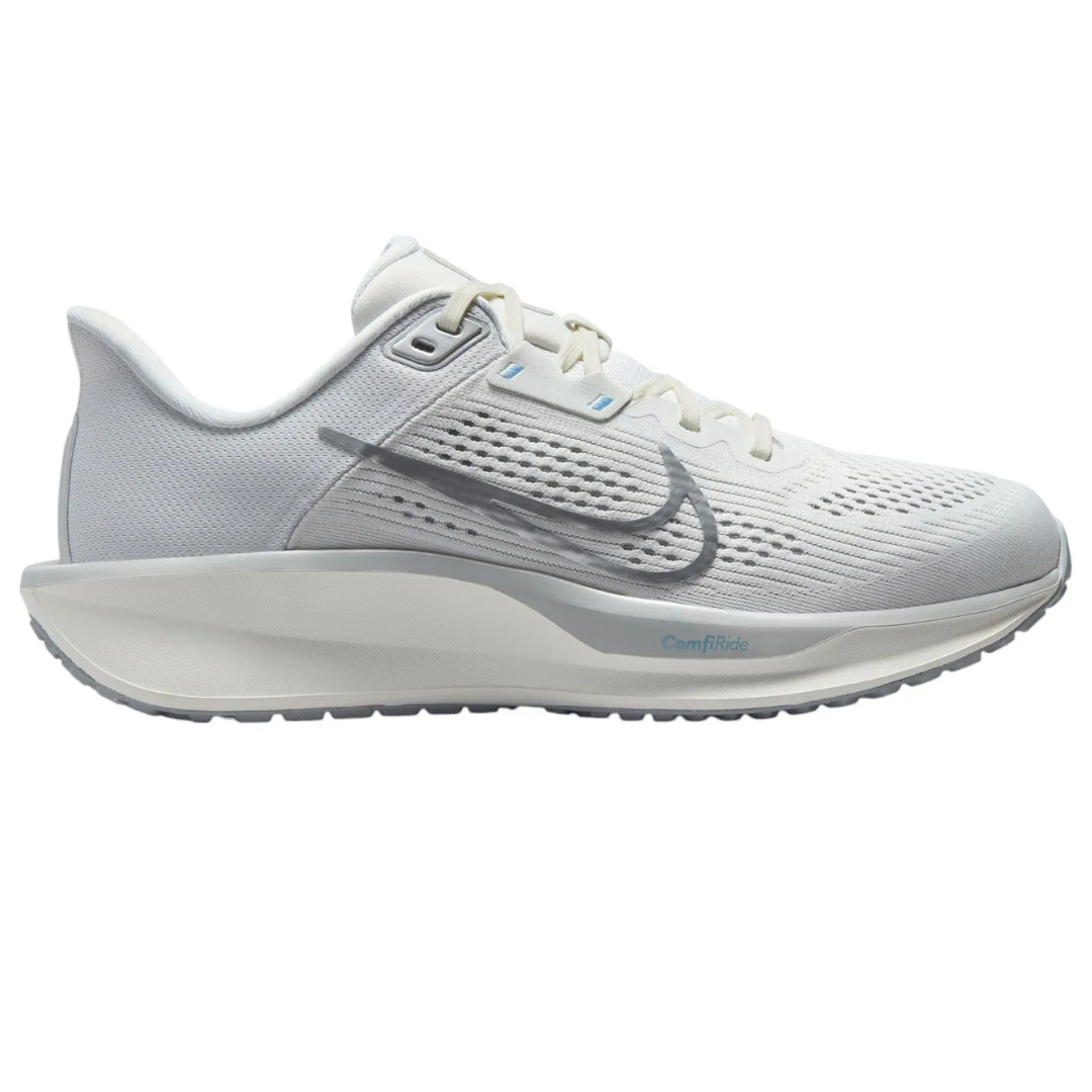 White and gray athletic running shoe with a mesh upper, featuring a prominent swoosh logo and labeled \“ComfiRide\“ on the midsole.