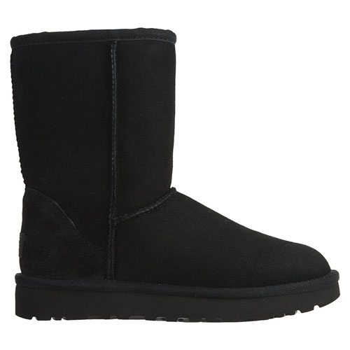 A black mid-calf boot with a flat sole, made from a soft textile material, featuring visible stitching.