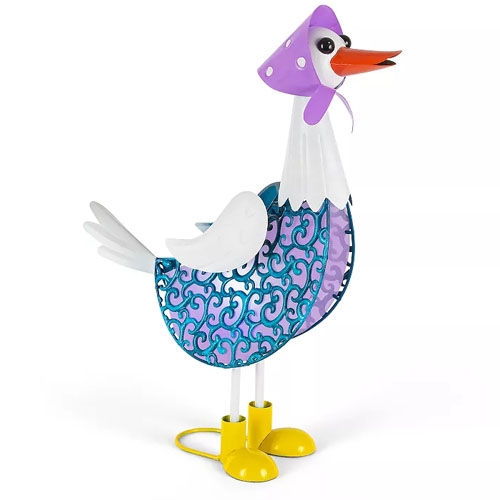 A decorative metal rooster-shaped sculpture with purple and blue patterns, wearing a purple hat and yellow boots.