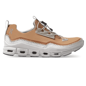 On Running Women's Cloudaway Shoes feature a tan mesh upper with a unique lacing system, prominent stitching, and a white CloudTec sole designed for comfort and lightweight performance.