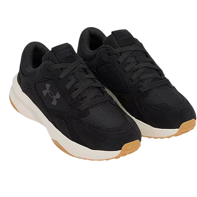 A pair of black athletic shoes with a mesh upper, featuring the Under Armour logo on the side. The shoes have a cushioned brown sole with a white midsole.