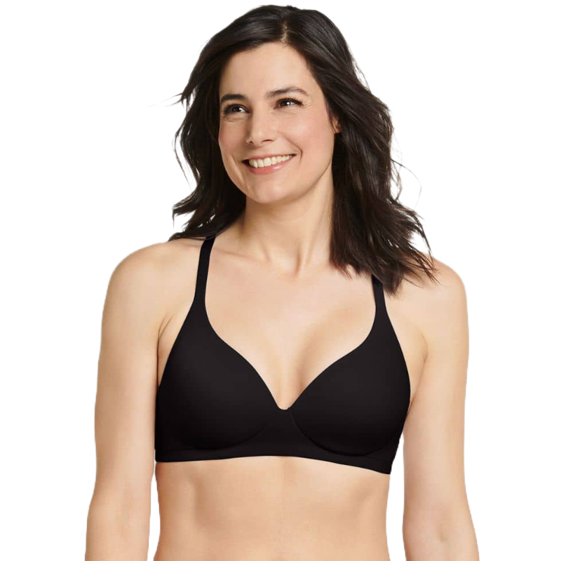 A woman wearing a black, convertible T-shirt bra with smooth, seamless cups and adjustable straps.