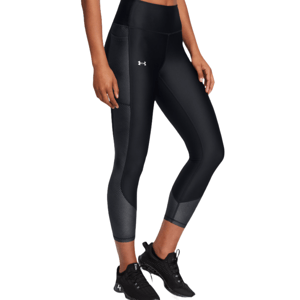 Under Armour HeatGear Ankle Leggings feature a sleek black design with a fitted silhouette, small side logo, and textured panels near the ankles, paired with black training shoes.