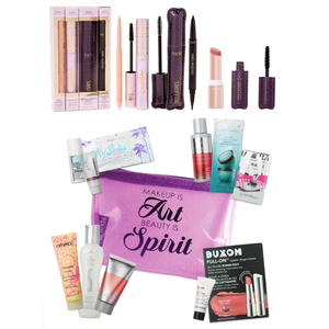 A four-piece Tarte eye makeup set includes two mascara tubes with spoolie brushes, an eyeliner pencil, and an eyelash curler with a purple handle.