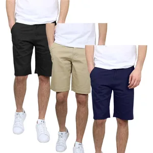 Three pairs of men's shorts in black, beige, and navy, paired with white sneakers and white T-shirts.