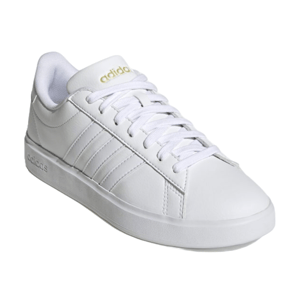 Adidas white low-top sneaker with gold logo, featuring a lace-up design and classic three-stripe detail on the side.
