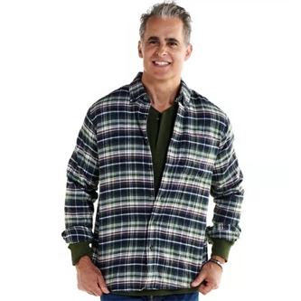 A man wearing a plaid button-up shirt over a solid-colored shirt.