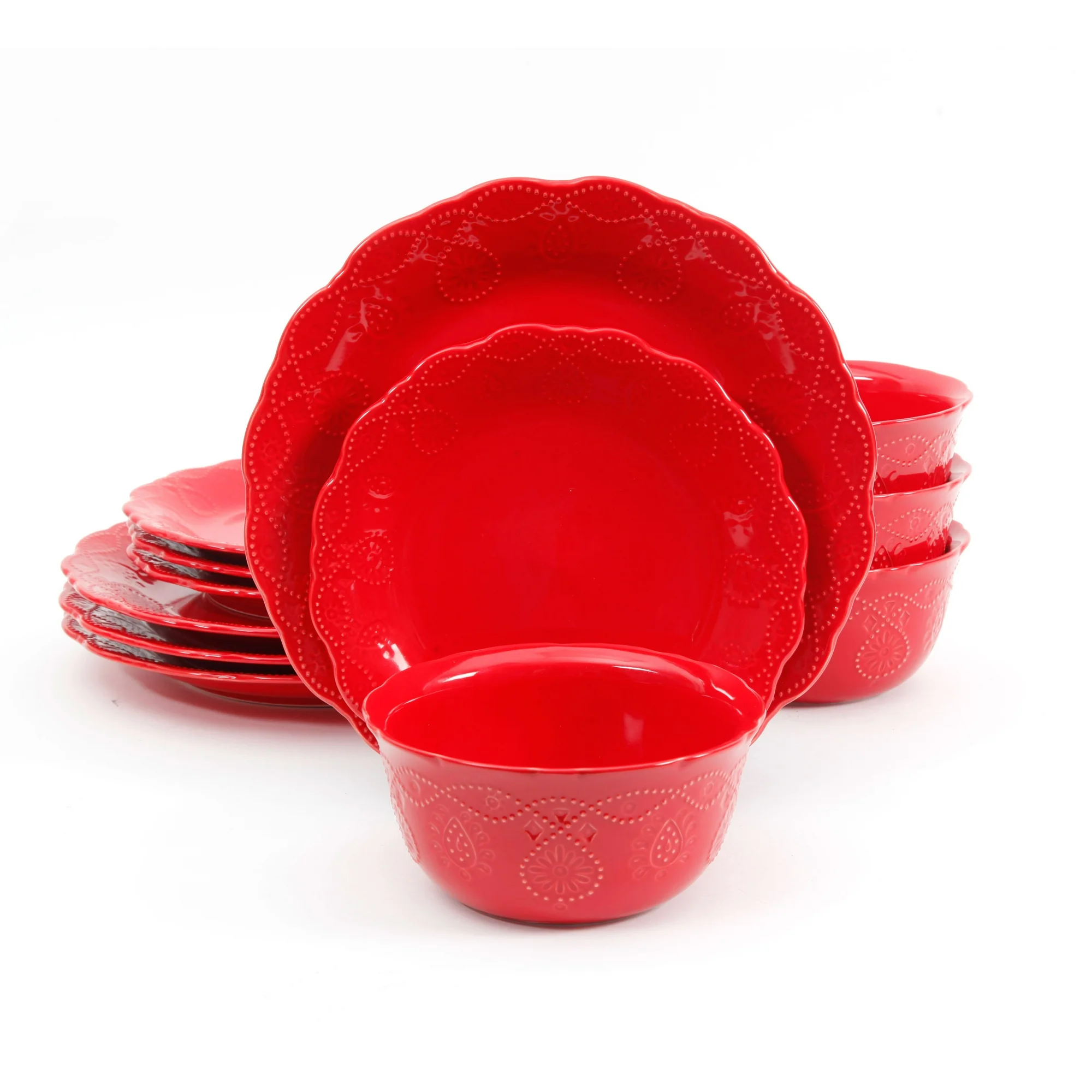 A set of red embossed dinnerware, including plates and a bowl.