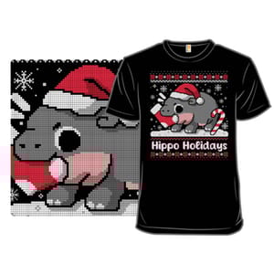Black T-shirt featuring a cute hippo wearing a Santa hat, holding a candy cane, with decorative elements and snowflakes. The text \“Hippo Holidays\“ is printed below the design, resembling a festive, pixelated holiday sweater theme.