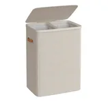 Dual-compartment laundry hamper with a beige fabric exterior and handles, featuring a liftable lid for easy access.