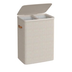 Dual-compartment laundry hamper with a beige fabric exterior and handles, featuring a liftable lid for easy access.