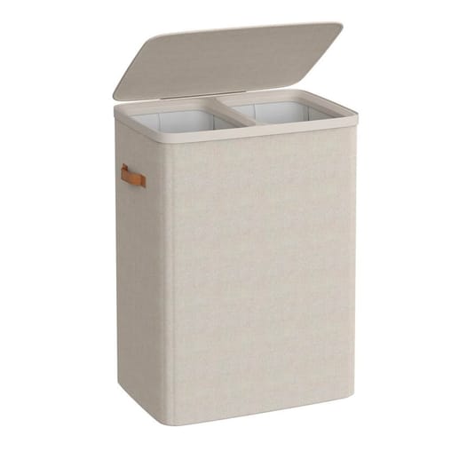 Dual-compartment laundry hamper with a beige fabric exterior and handles, featuring a liftable lid for easy access.