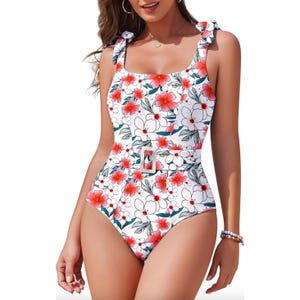 One-piece swimsuit with red and white floral print, featuring adjustable tie straps, a square neckline, and belted waist for tummy control.