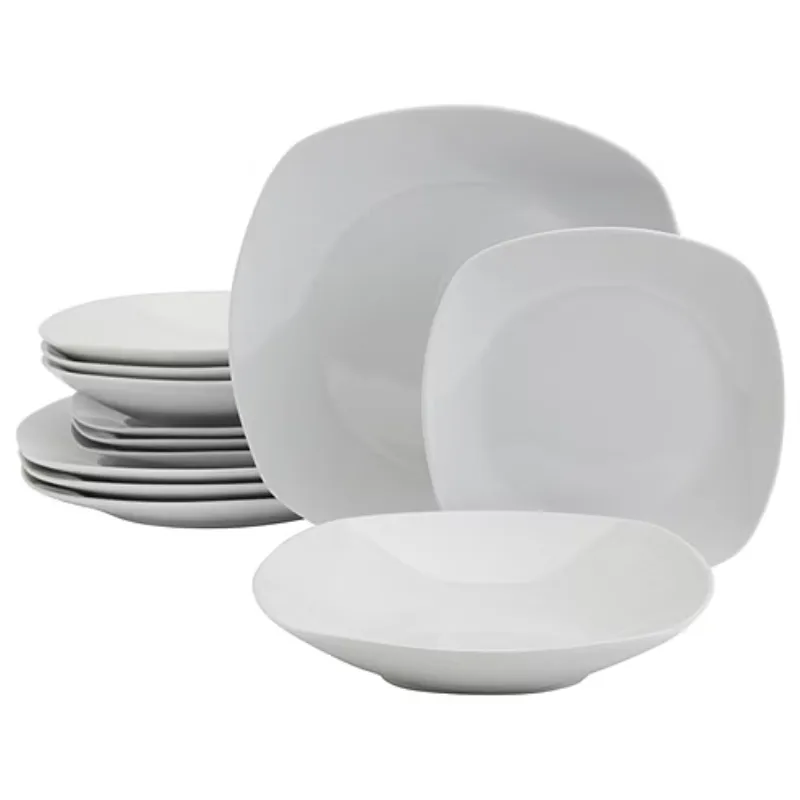 A set of white dinnerware featuring square-shaped plates and a bowl, with a minimalist design.