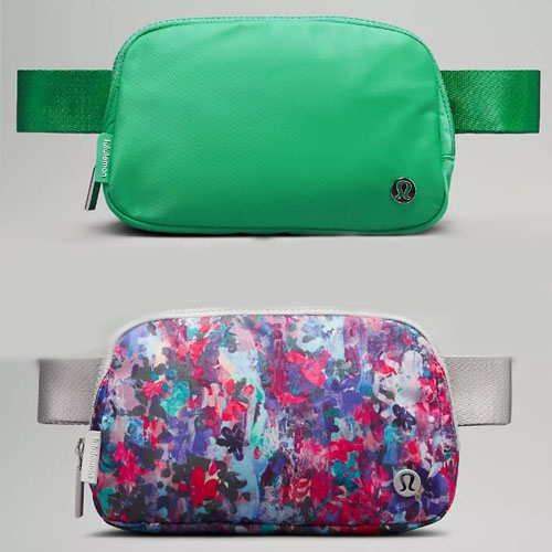 Two waist bags: top one is solid green, bottom features a colorful abstract print.