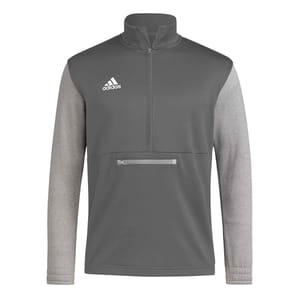 Adidas Men's Half-Zip Pullover in gray features a high collar with a zip closure, logo on the chest, and a pocket zipper on the front. The sleeves and lower half are a lighter gray, providing a contrasting two-tone design.