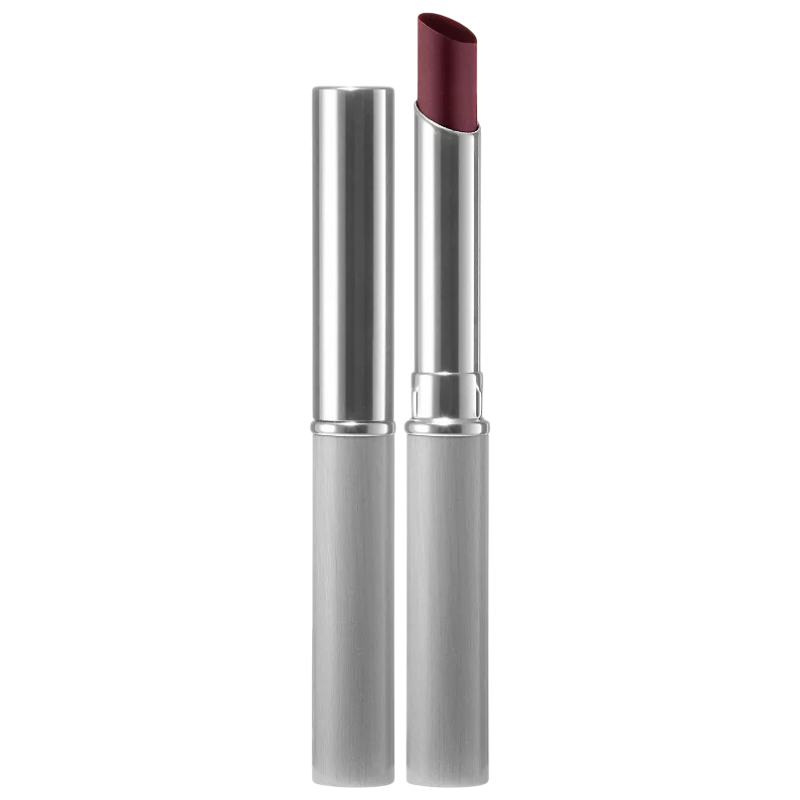 A burgundy lipstick in a sleek silver tube with the cap placed next to it.