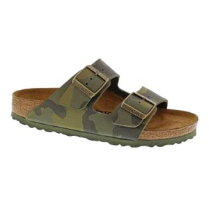 A Birkenstock sandal with a camouflage pattern, featuring two adjustable straps and a cork footbed.