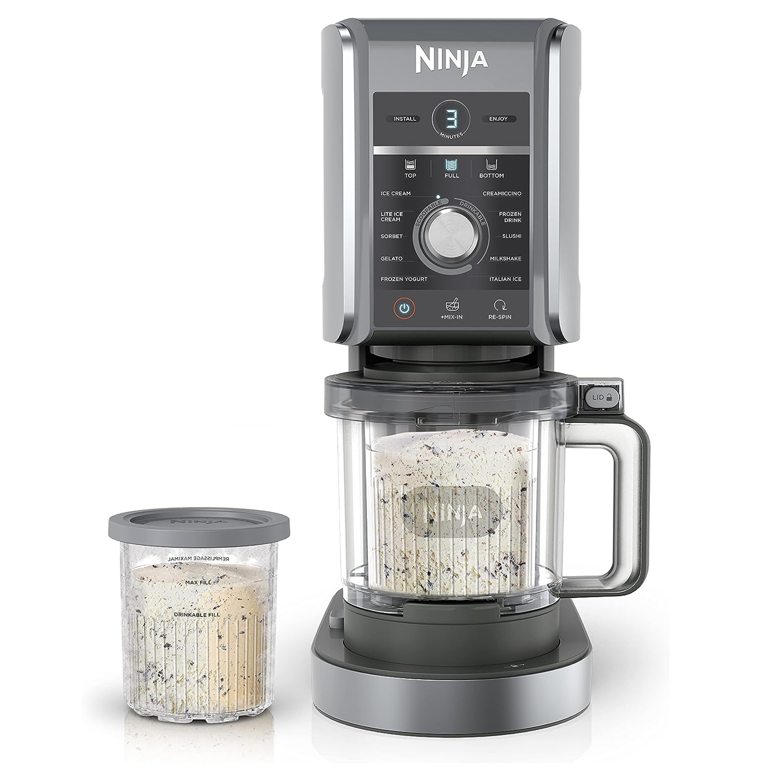 The Refurb Ninja Creami Deluxe is an ice cream maker with a sleek gray design, featuring multiple settings for various frozen treats. It includes a main unit with a container and an additional storage container.