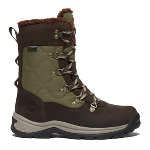 Timberland Women's Tall Snow Boots feature a green and brown color scheme with a quilted design, lace-up front, and plush interior lining for warmth. They have a durable rubber sole and reinforced eyelets for stability and traction.