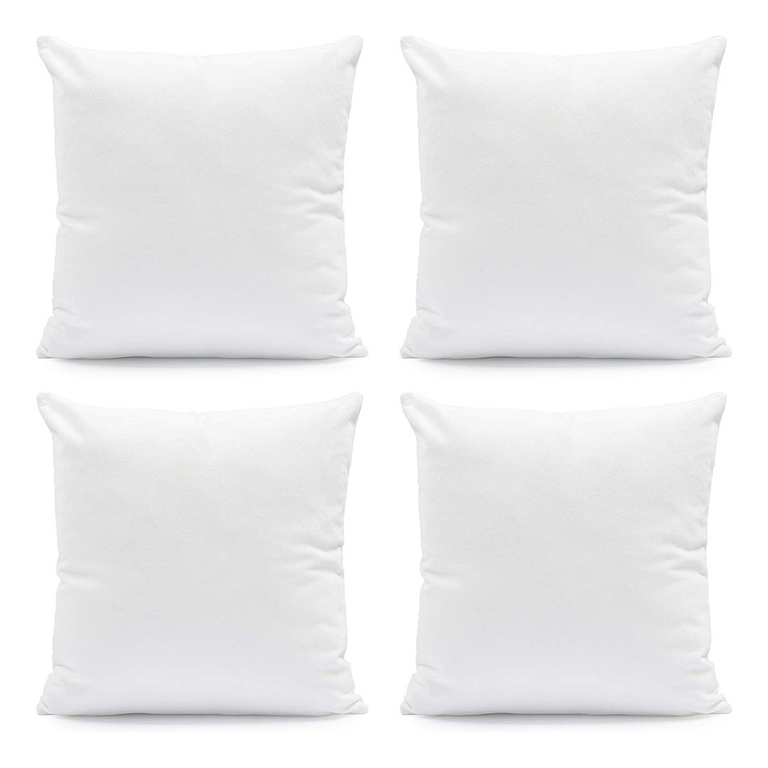Set of four plain white square pillows.