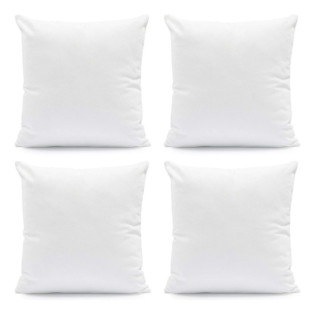 Set of four plain white square pillows.