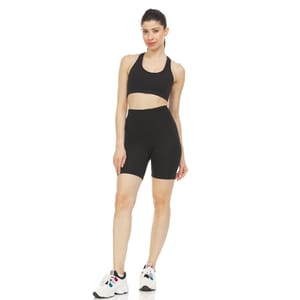 High-waisted black bike shorts featuring fitted design with side pockets, paired with a matching sports bra.