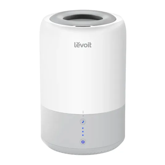 A white Levoit air purifier with minimalist design, featuring touch controls and LED indicators on the lower half.