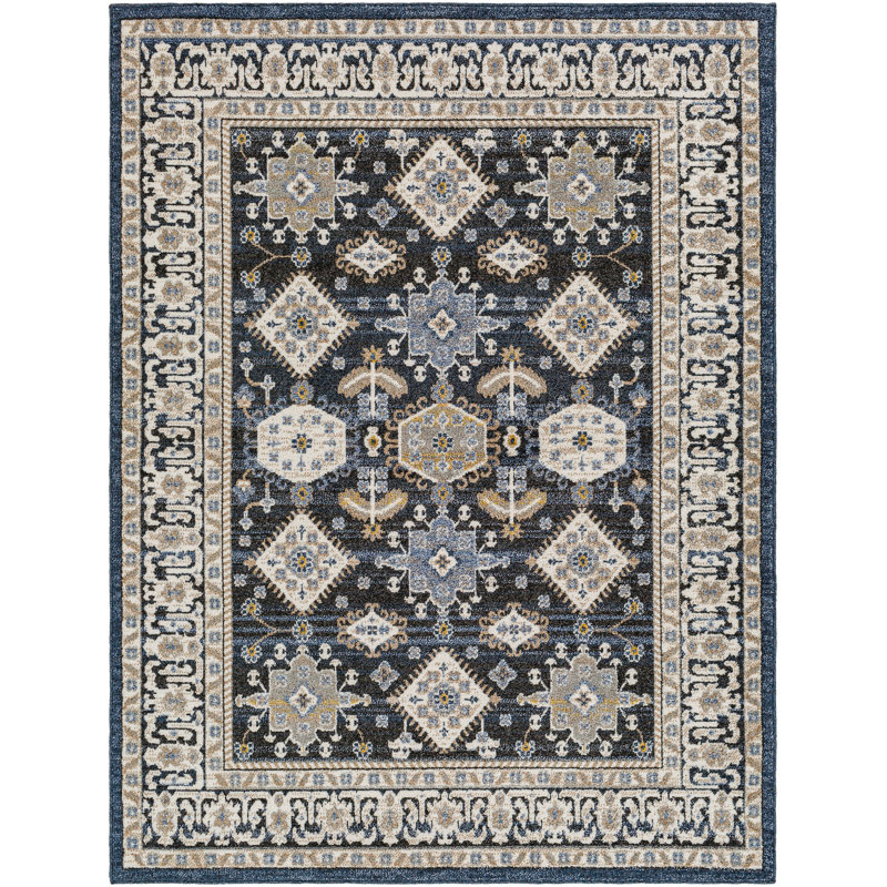 5' x 7' traditional area rug with a symmetrical pattern, featuring geometric shapes and floral motifs in blue, gray, and beige tones, framed by a detailed border.