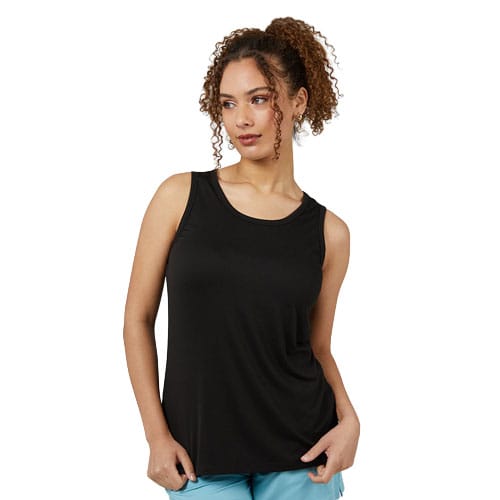 A woman is wearing a sleeveless black tank top paired with light blue shorts.