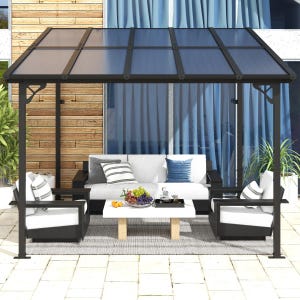 A patio seating area with a modern pergola features a couch and two armchairs with striped cushions, a coffee table with fruit and drinks, set on a tiled floor near a potted plant, against a wooden and glass backdrop.