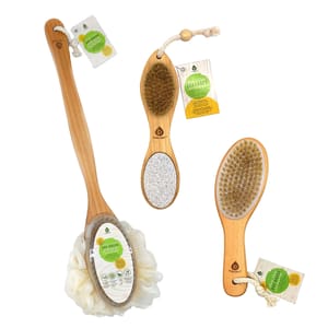 3-piece bath exfoliation set includes a long-handled dry brush with a loofah, a dual-sided brush with natural bristles and pumice stone, and a handheld dry brush with bristles, each featuring wooden handles and rope loops for hanging.