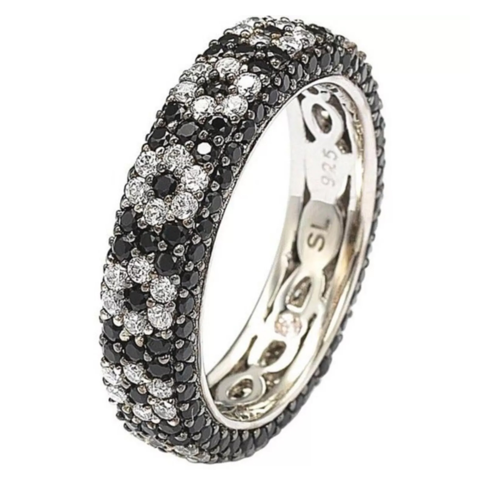 A silver band ring set with alternating black and white round stones, featuring a patterned design and marked \“925\“ on the inner side.