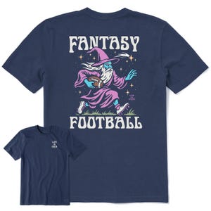 Navy blue T-shirt featuring a wizard playing football graphic with the text \“FANTASY FOOTBALL\“; front displays \“Life is Good\“ logo.