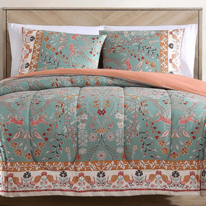 A floral-patterned bedding set featuring a quilt and two pillow shams in a mix of teal, coral, and earthy tones with intricate botanical and decorative motifs.