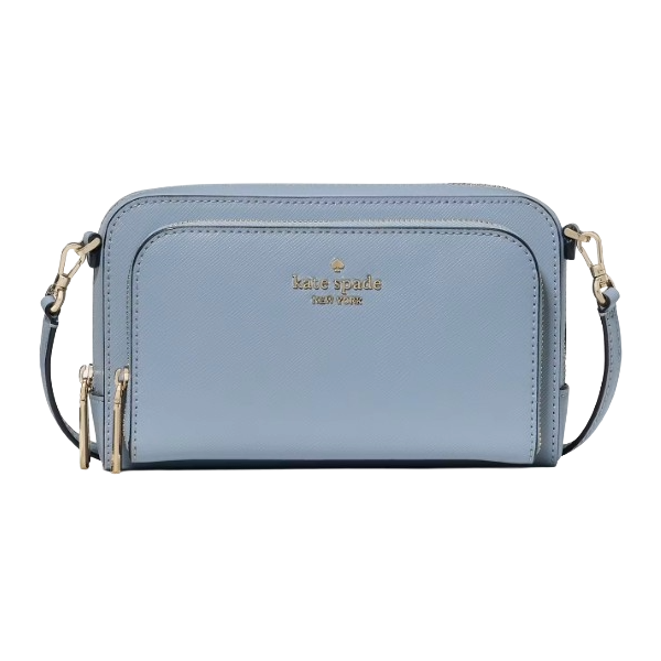 A light blue Kate Spade New York crossbody bag with gold hardware, featuring a front zip pocket and a detachable strap.