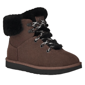 UGG women's Alpine Mini Boots are brown with black fur lining and black-and-white lace-up detailing. They feature a suede exterior, a plush interior, and a sturdy black rubber sole.