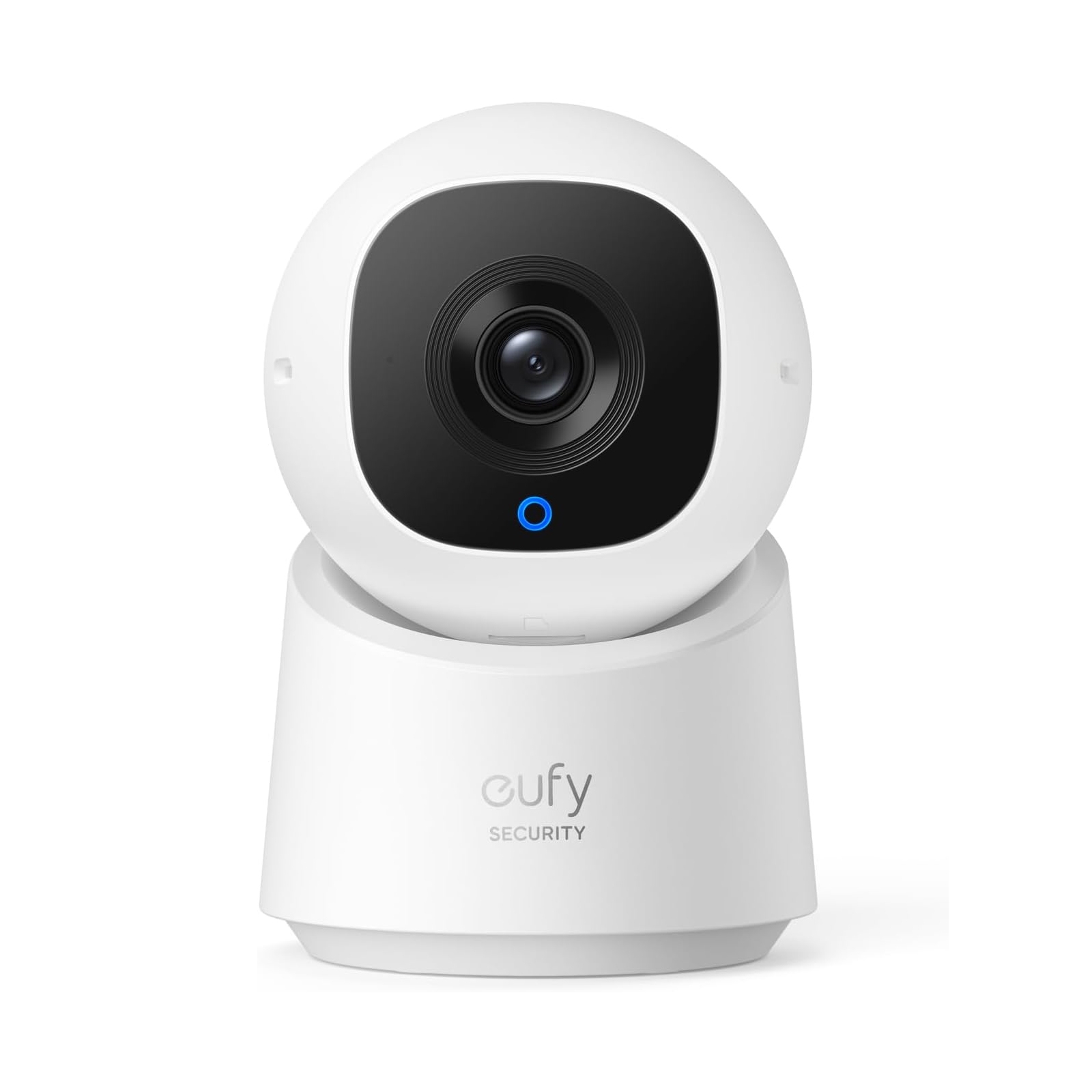 The Eufy Pan & Tilt Indoor Cam is a white, round security camera with a black face, featuring a central lens and a blue indicator light. It offers movable positioning for enhanced surveillance coverage within indoor spaces.