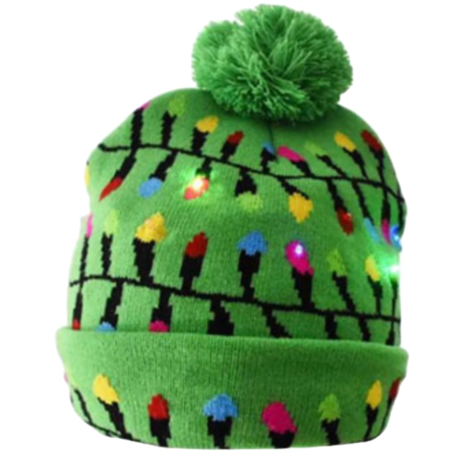 Green beanie with a Christmas light pattern and a pom-pom on top.