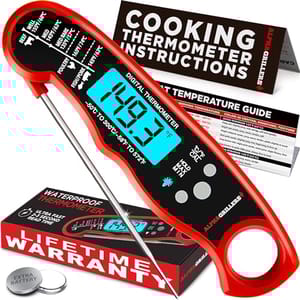 A red digital instant-read meat thermometer with a foldable probe is displayed, alongside its packaging that offers a lifetime warranty and an extra battery.