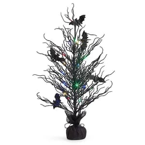 A black Halloween tree with multicolored lights and bat decorations, set in a black fabric-wrapped base.