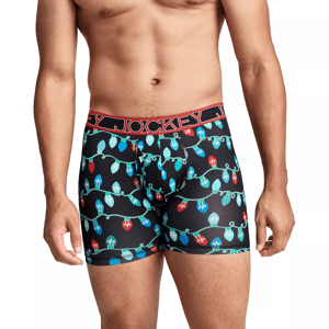 Men's boxer briefs by Jockey featuring a multicolored string of Christmas lights pattern on a black background, with a red waistband displaying the brand name.