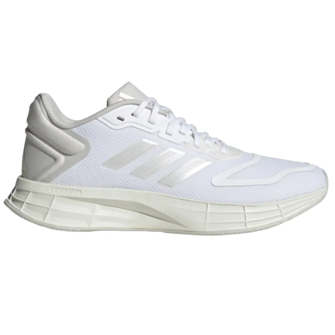 White athletic shoe with a mesh upper, three stripes on the side, and a thick sole labeled \“LIGHTMOTION\“ for cushioning.